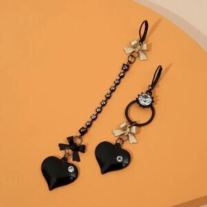 Gothic Asymmetrical Heart Drop Earrings – Black Enamel with Gold Bows